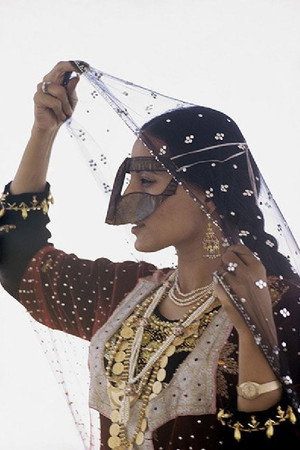 Behind the Veil